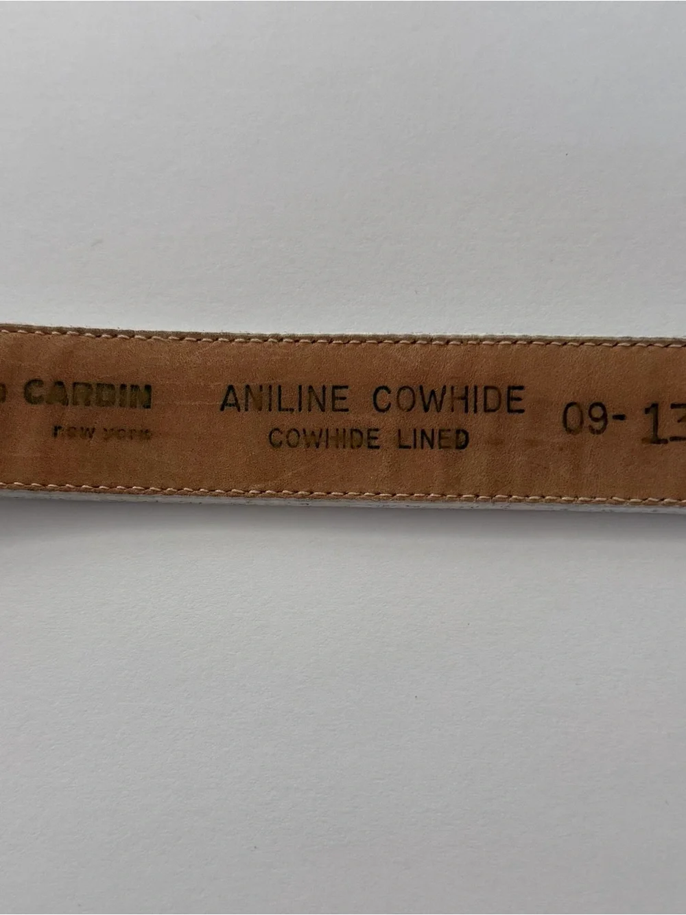 pierre cardin white belt textured, leather-and gold-tone buckle.